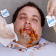 Meatstroke victim Tom Eppard is cleaned by rescue workers.